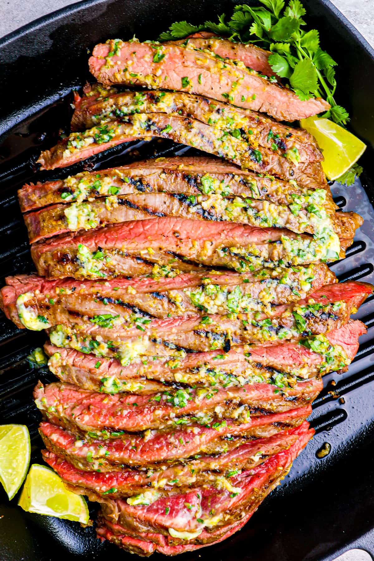 close up on grilled flank steak cut up intro thin strips