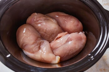 raw chicken breast in a crockpot