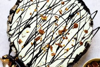 ice cream pie topped with chocolate drizzle