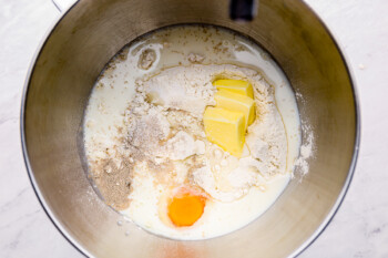 parker house roll dough ingredients in a stand mixer.