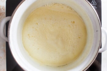 cream boiling in a pot