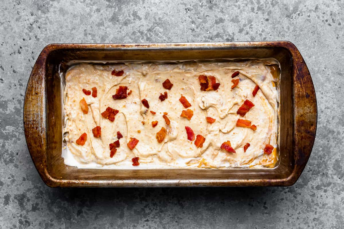 Rustic metal pan filled with peanut butter dog ice cream.