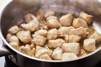 chicken cooking a skillet