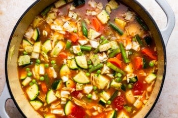 large pot filled with soup and chopped up vegetables