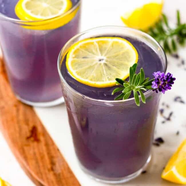 two glasses of lavender cocktail drinks