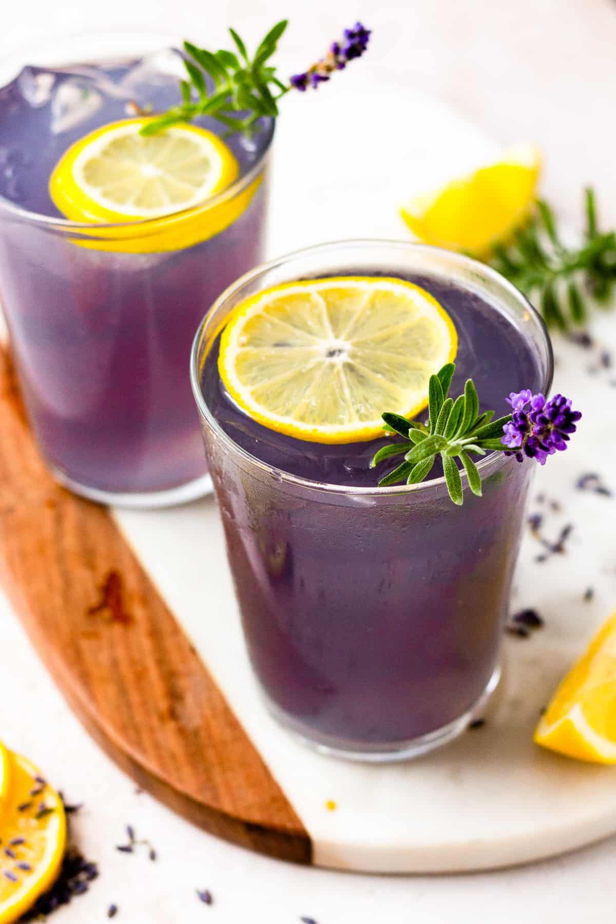 two glasses of lavender cocktail drinks