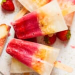 margarita popsicles stacked up on a board