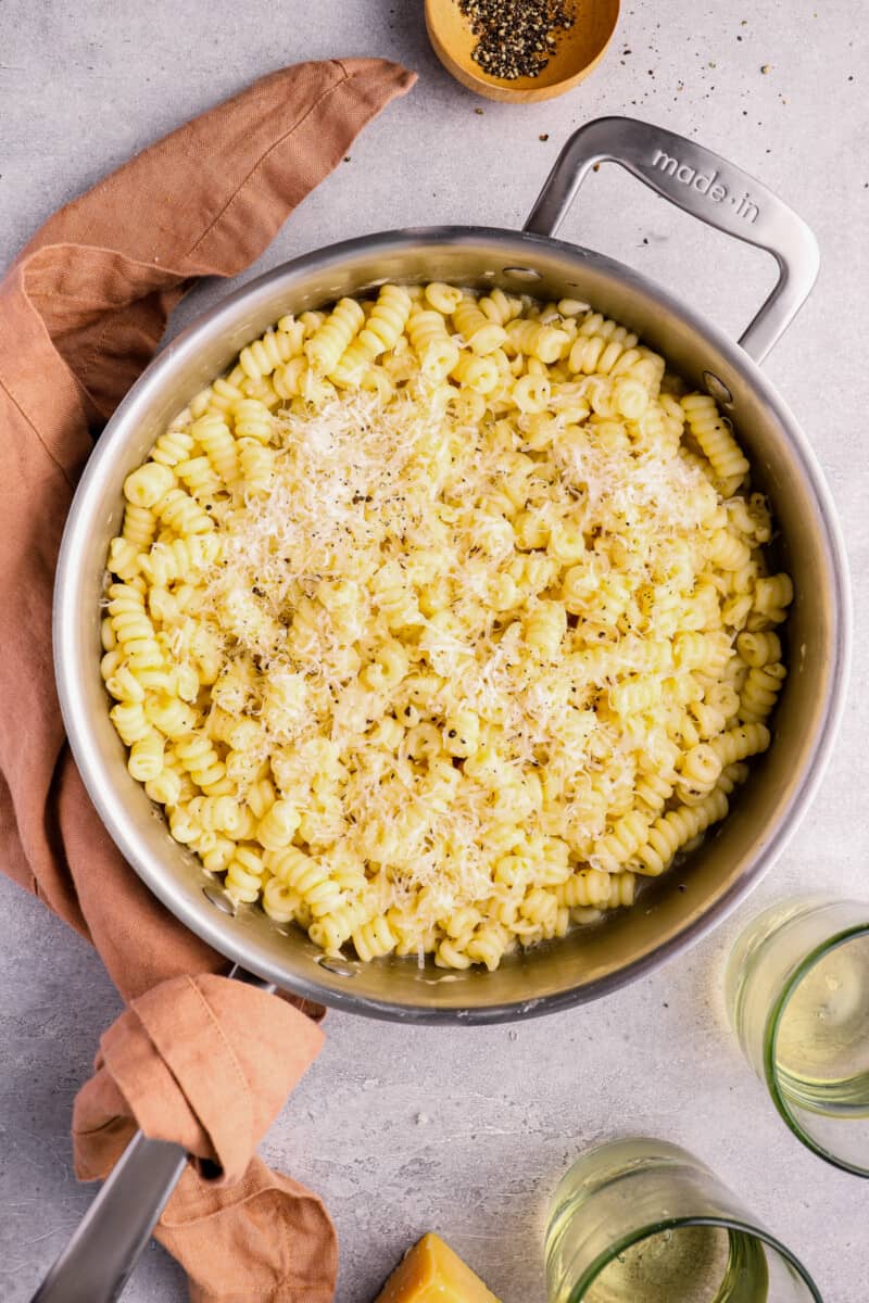 overhead view of cacio e pepe in a stainless steel pot.