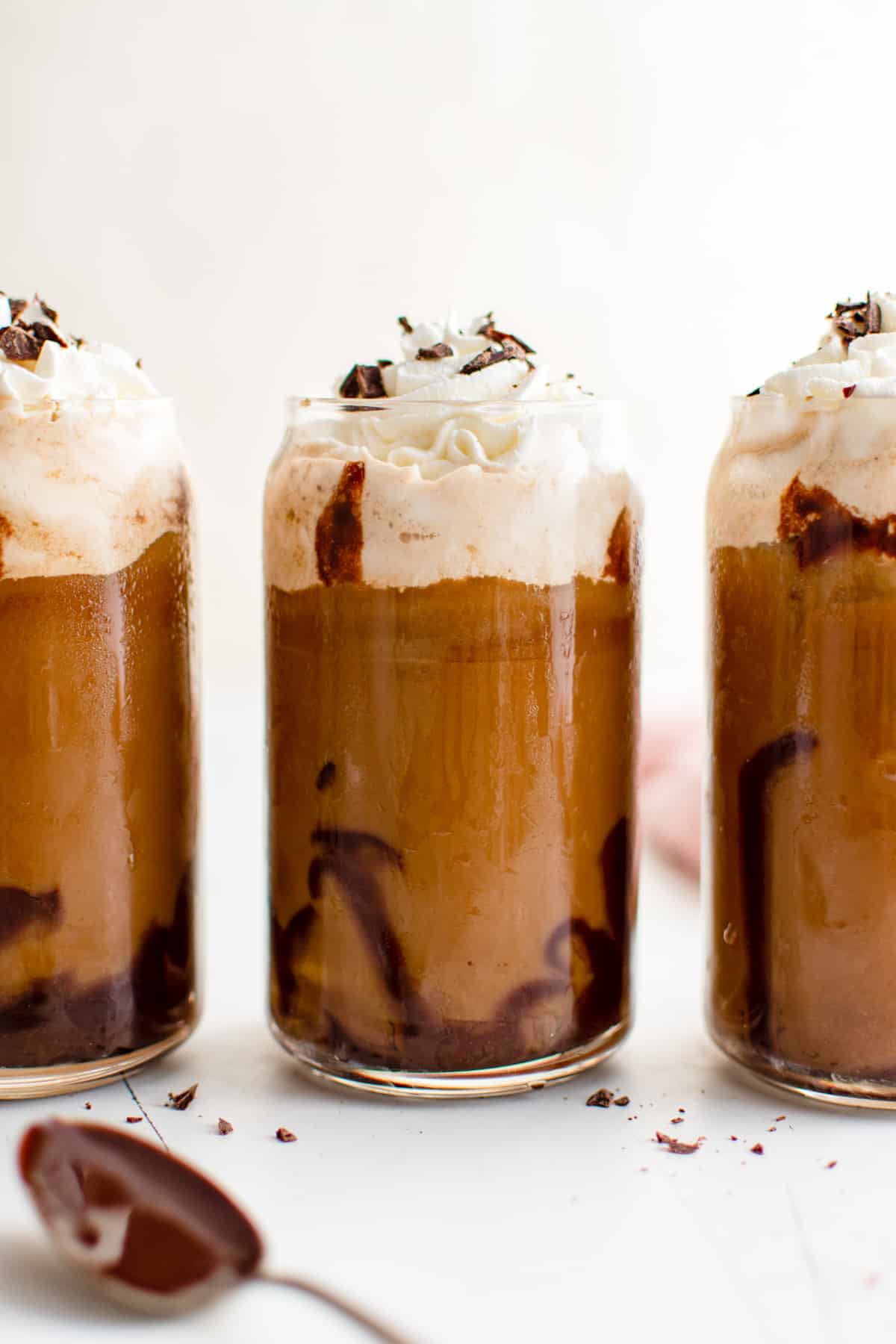 three chocolate coffees lined up