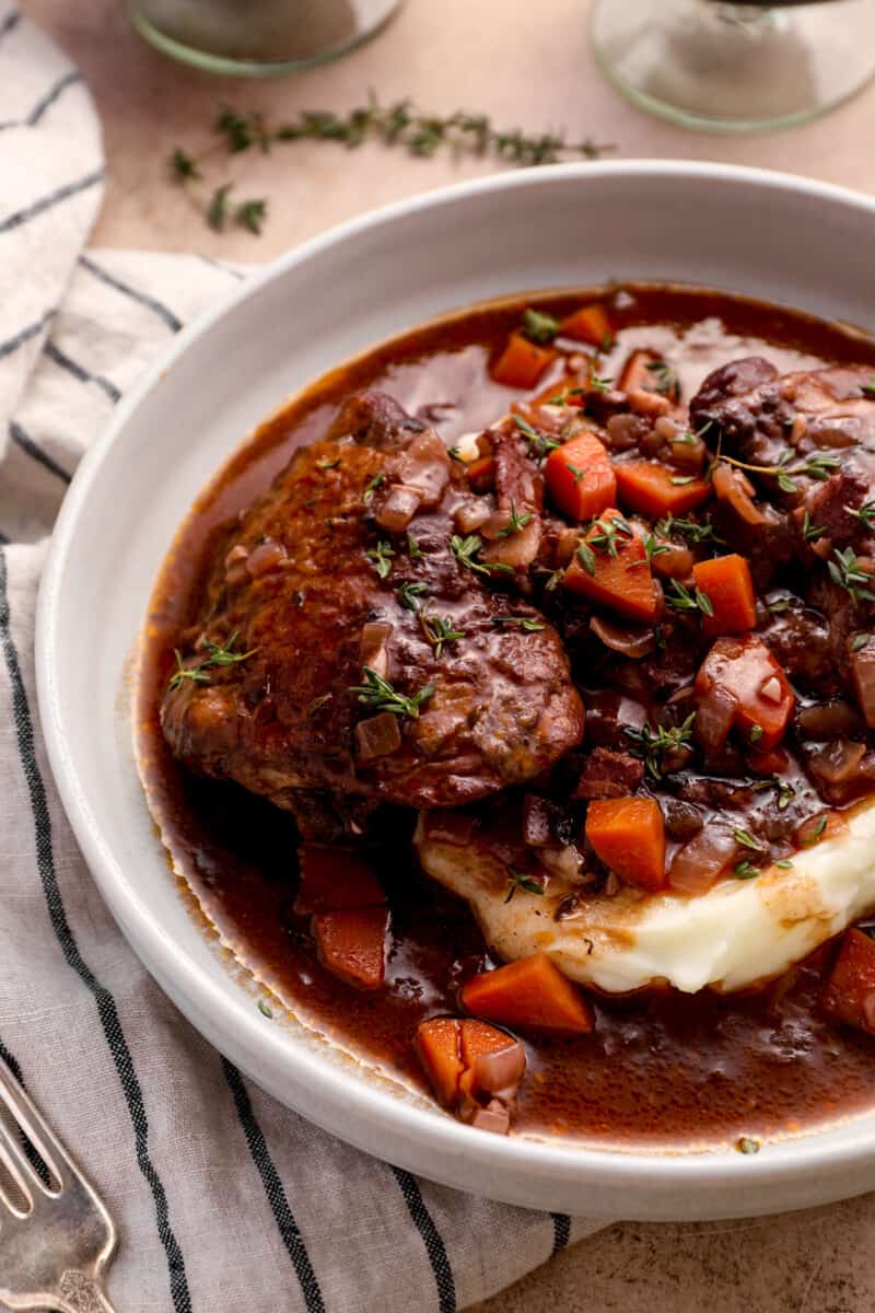 close up on a bowl of chicken coq au vin