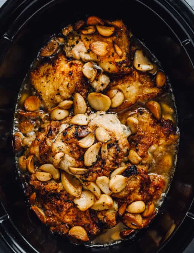 overhead view of 40 clove garlic chicken in a crockpot