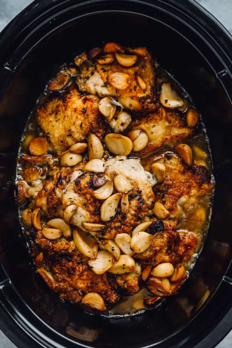 overhead view of 40 clove garlic chicken in a crockpot