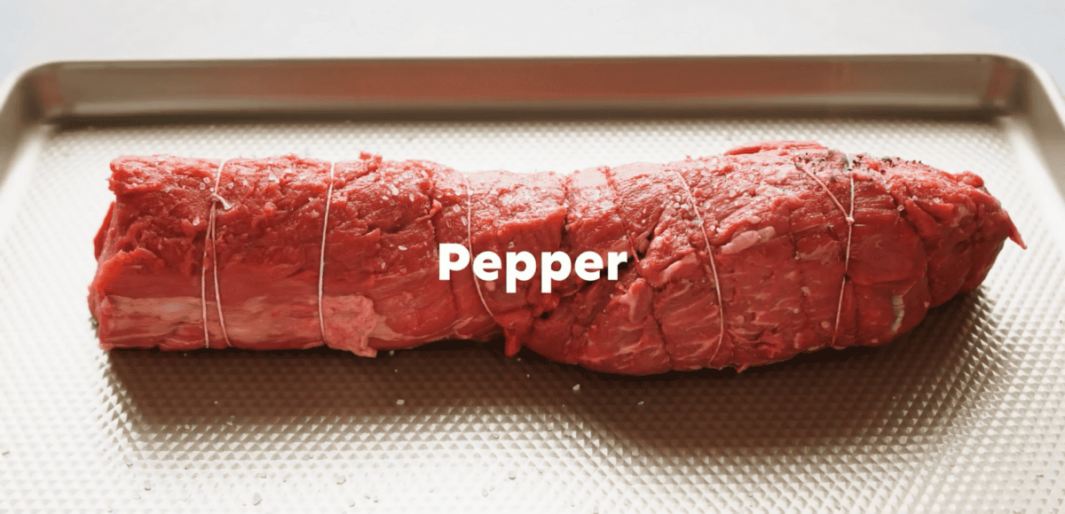 Seasoned beef tenderloin with salt and pepper.