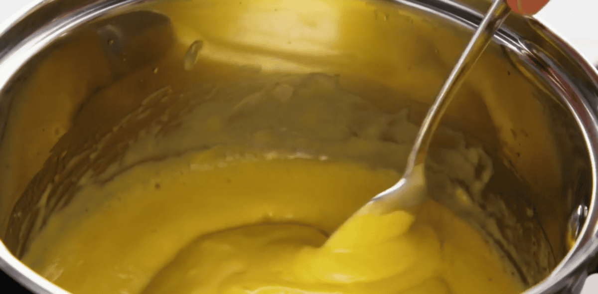 Sauce sticking to the back of a spoon.