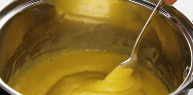 Sauce sticking to the back of a spoon.