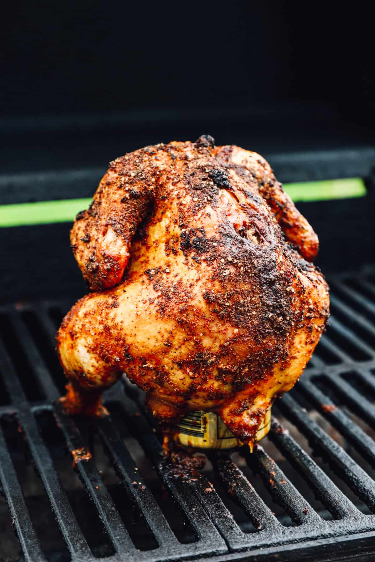 beer can chicken cooking on the grill