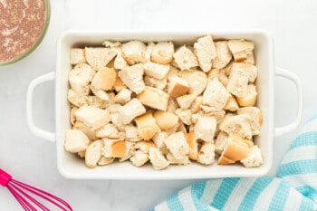 cubes of bread in a casserole dish