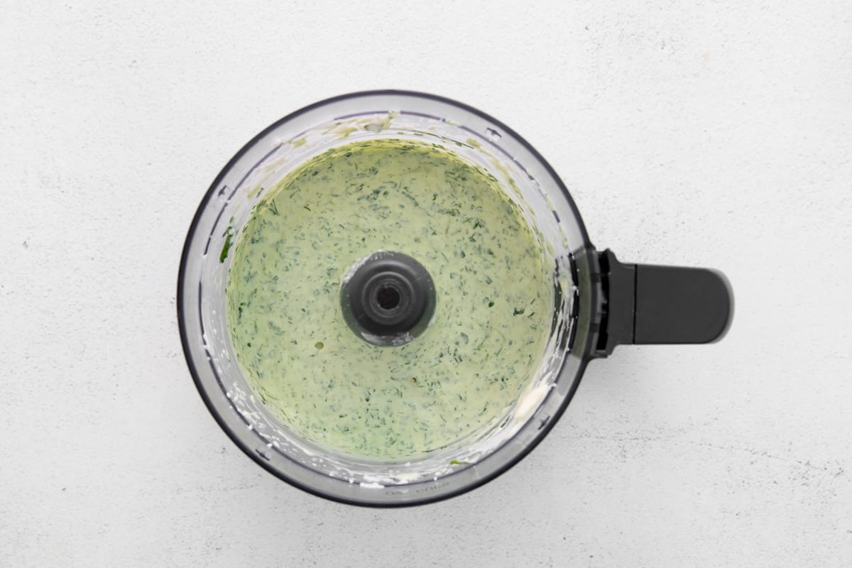 Making green goddess dressing in a food processor. - 9