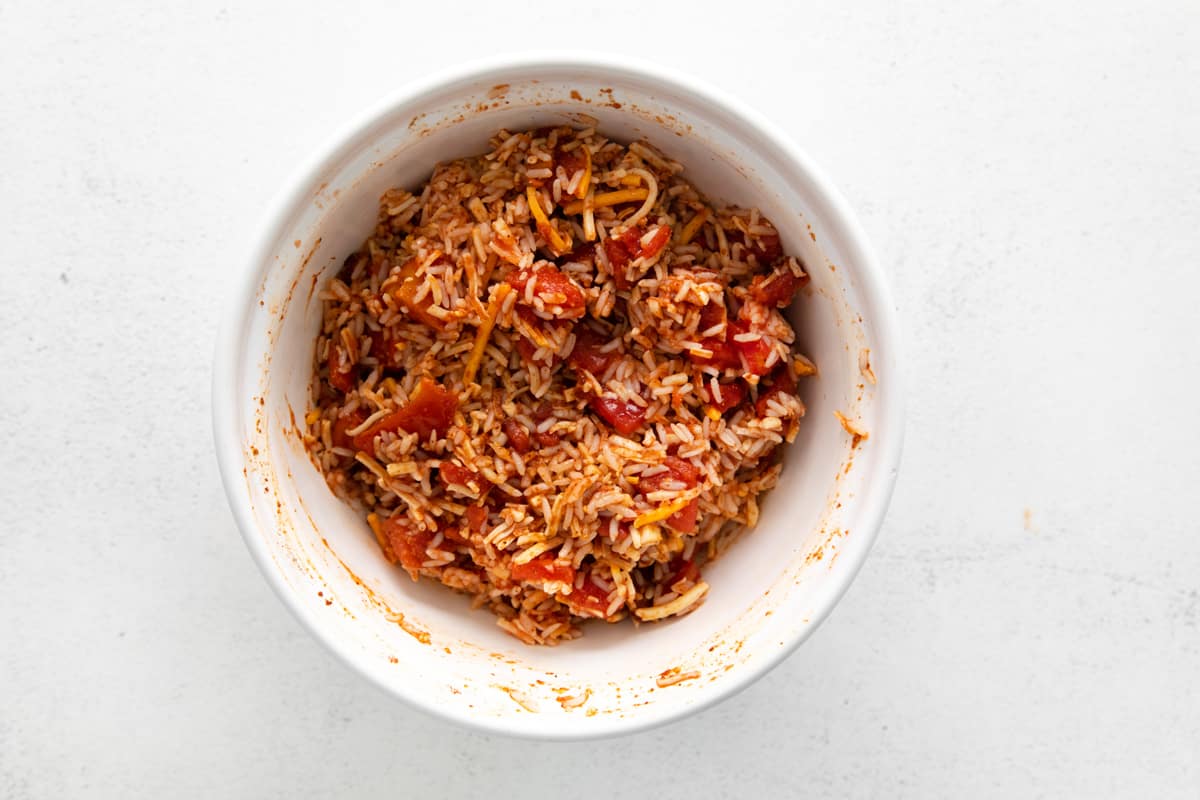 Overhead view of instant pot stuffed pepper filling in a white bowl.