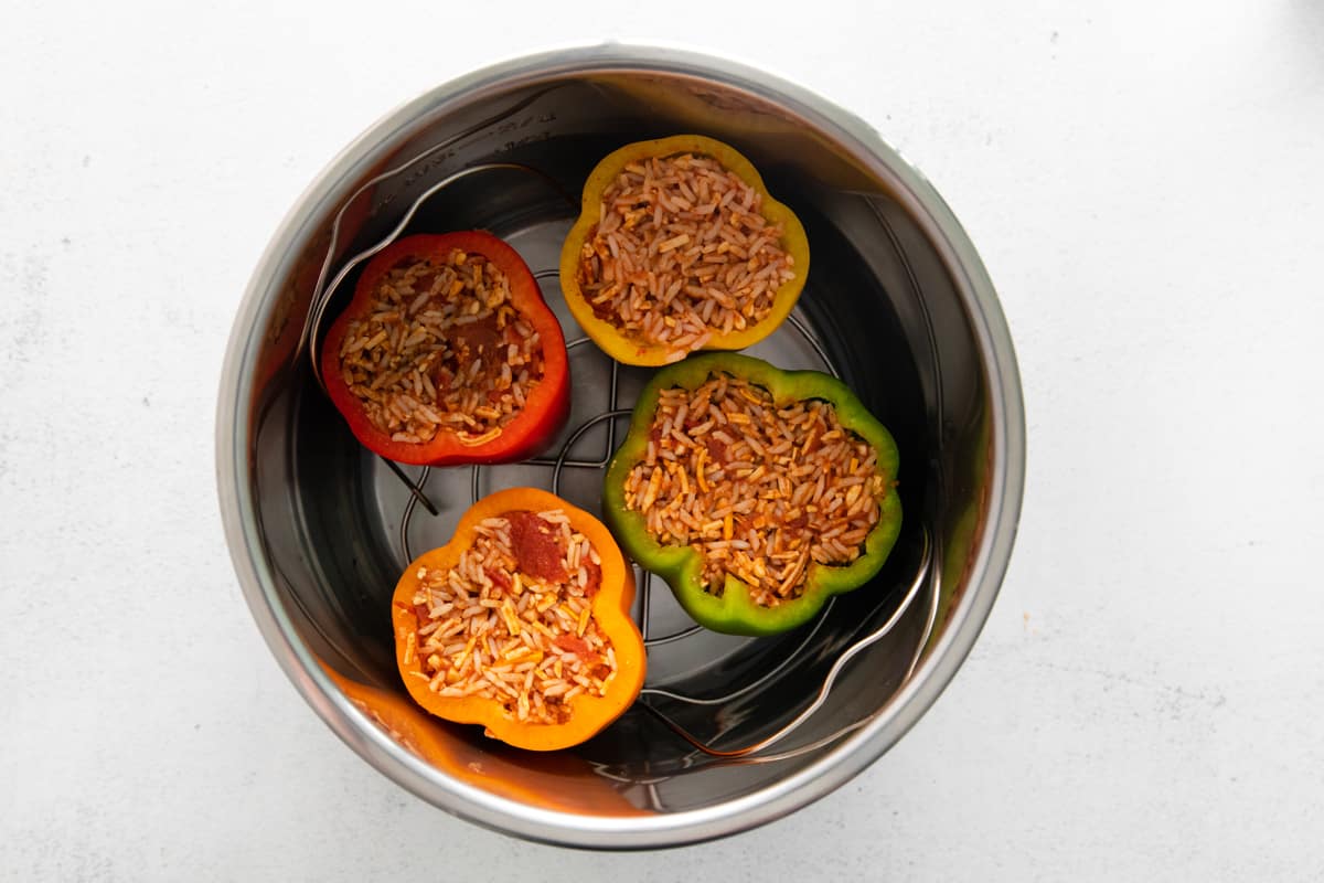 Overhead view of instant pot stuffed peppers in an instant pot.