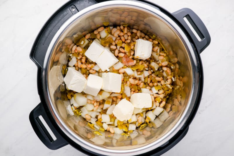 ingredients for white chicken chili in an instant pot.