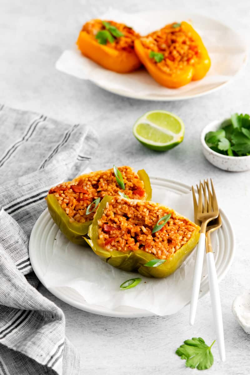 a halved instant pot stuffed pepper on a white plate.