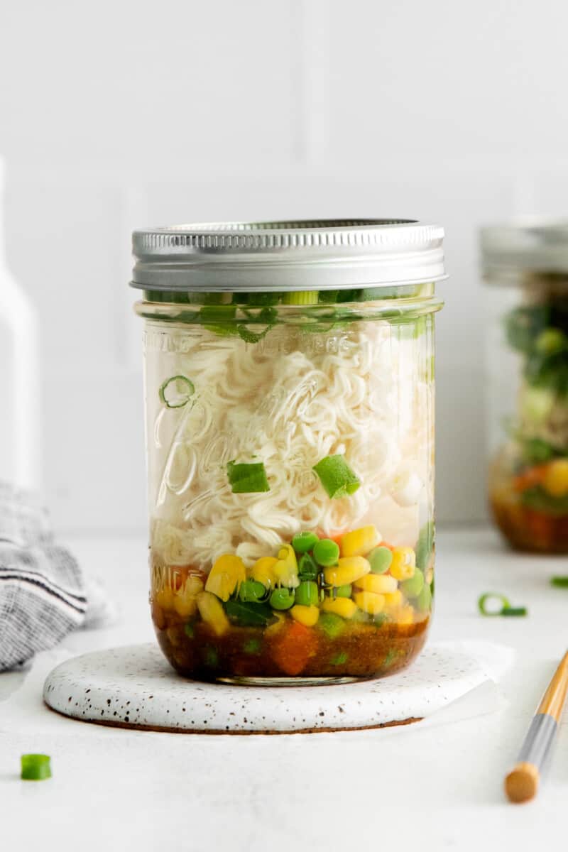 noodles and veggies in a mason jar