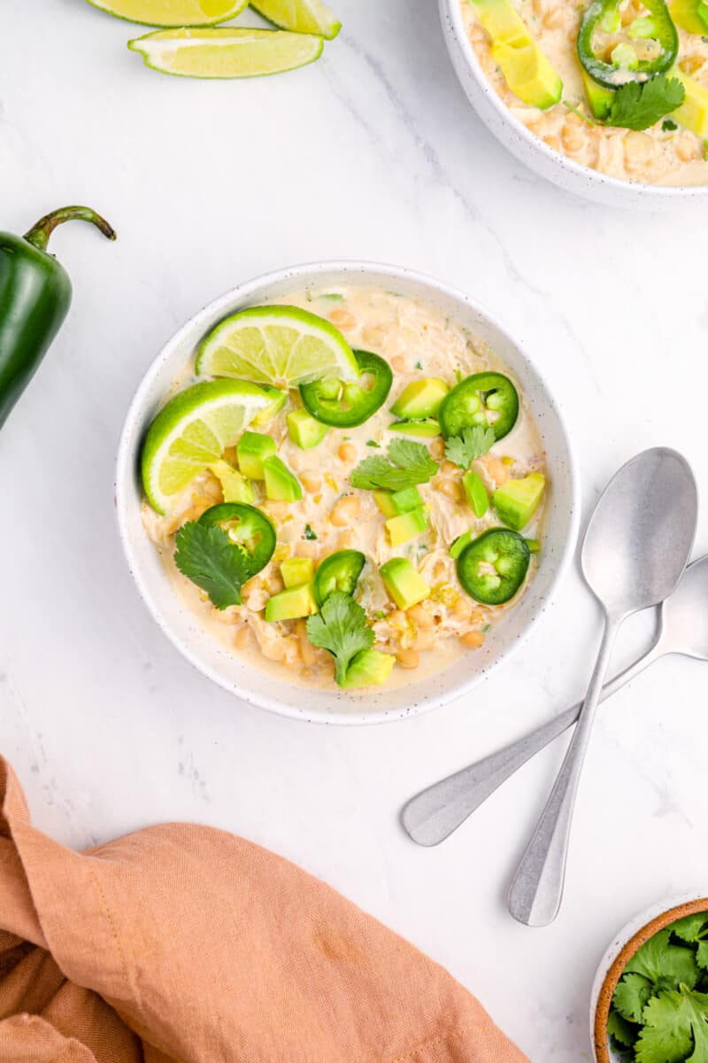 overhead view of instant pot white chicken chili in a white bowl.