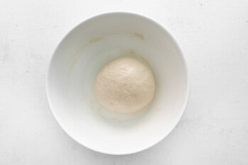 small ball of dough in a mixing bowl