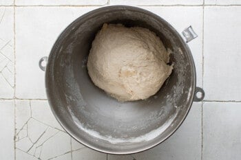ball of bread dough in a mixing bowl