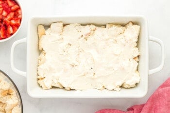 layer of cream cheese spread on top of French toast casserole