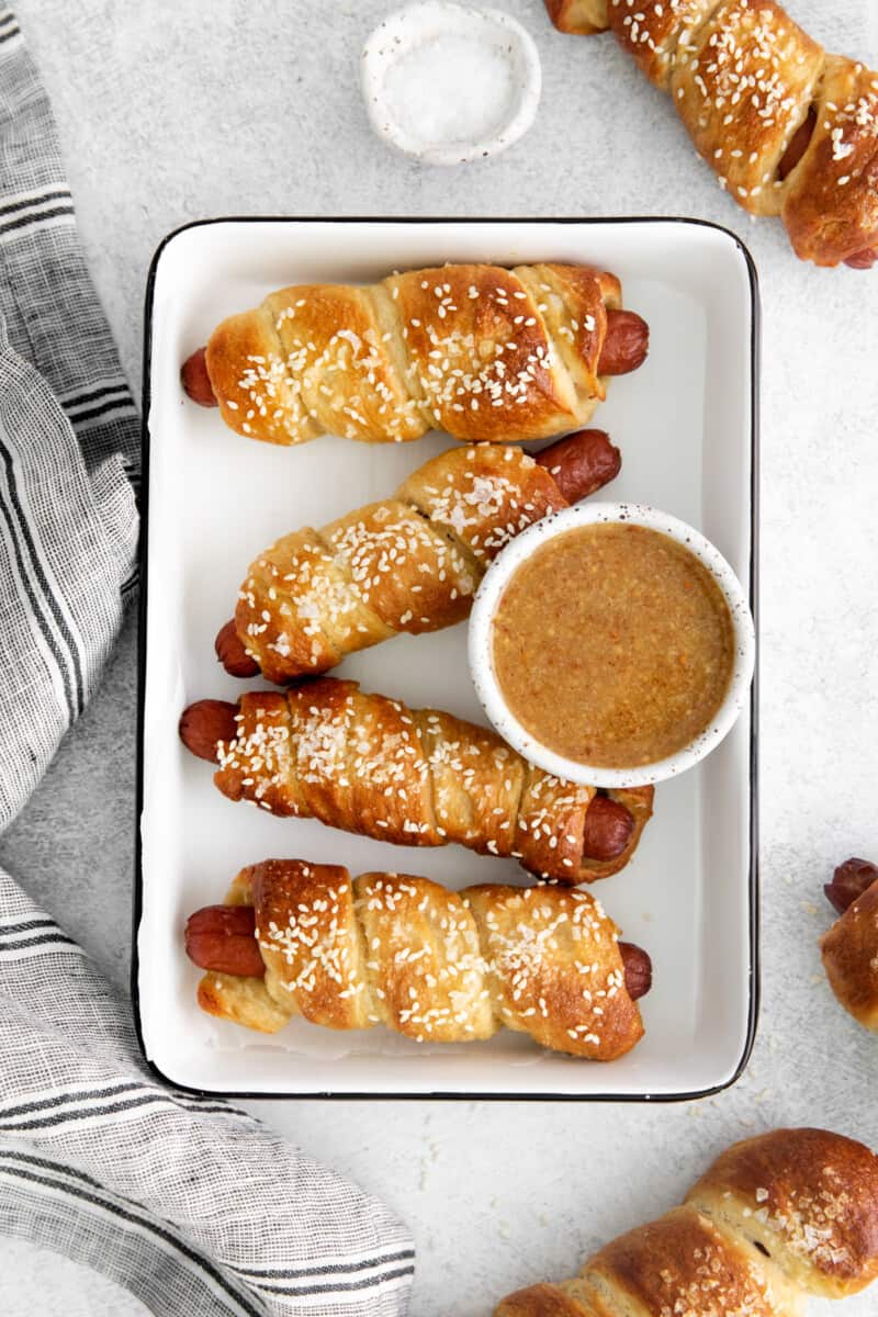 homemade pretzel dogs on a tray