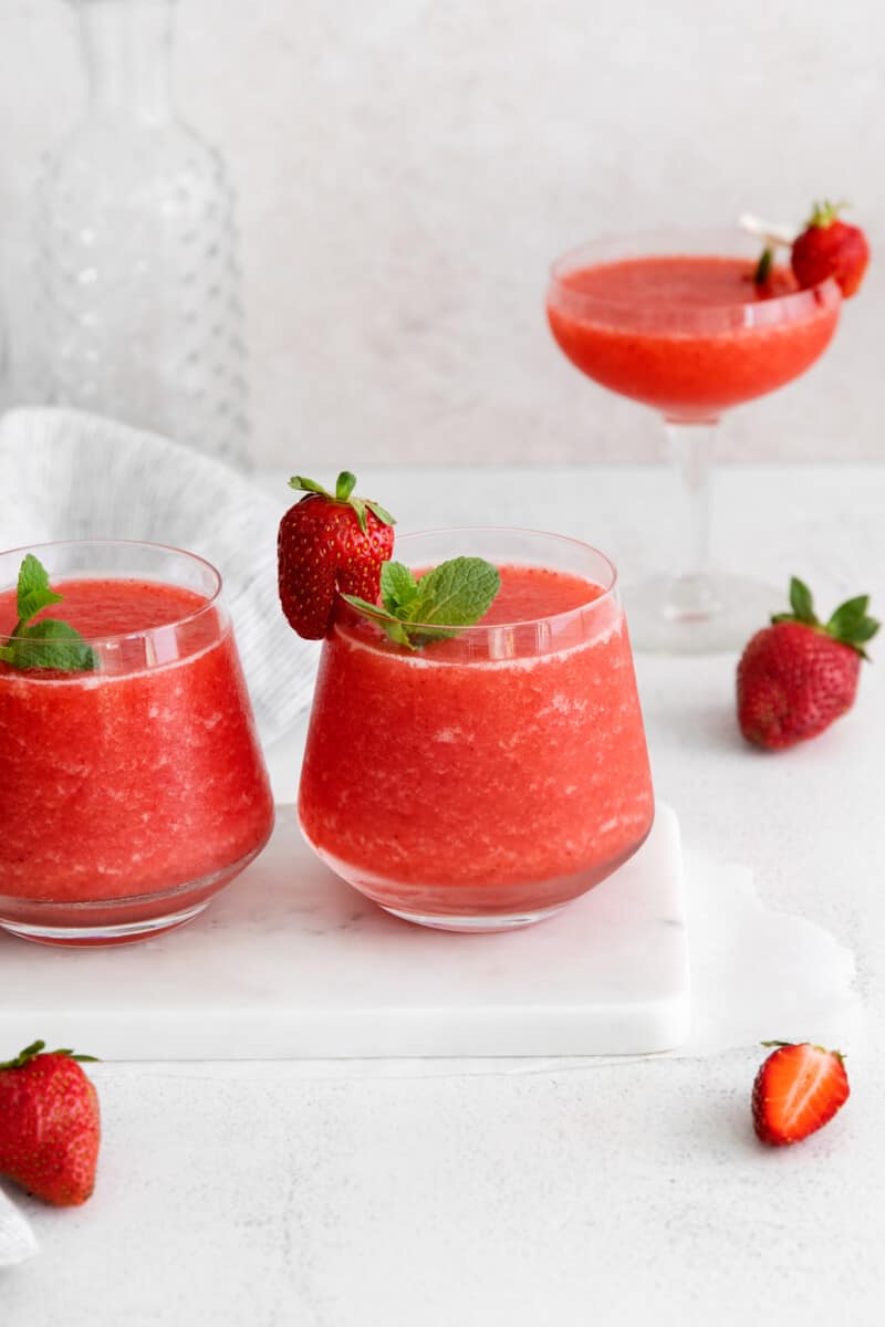 frozen strawberry cocktails in three glasses