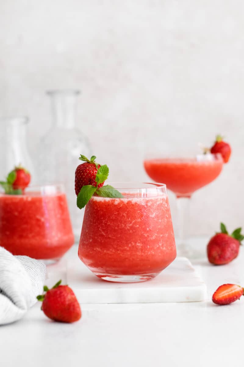 various types of glasses filled with strawberry frose