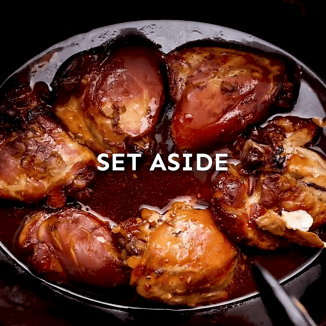 cooked chicken in a crockpot with a message to set aside. 