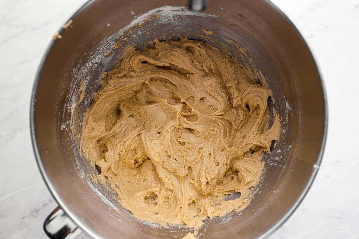 Cookie dough after adding eggs and vanilla, smooth and creamy texture