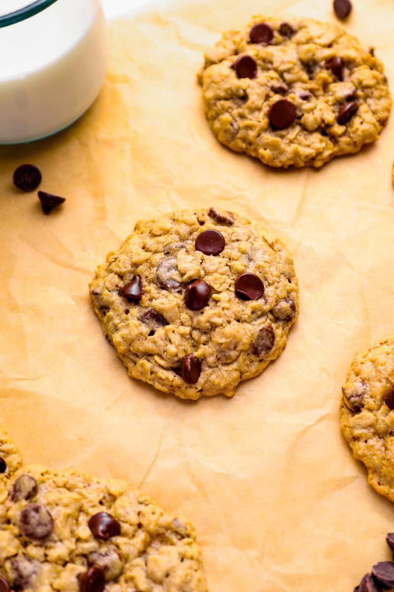 soft oatmeal chocolate chip cookies on parchment