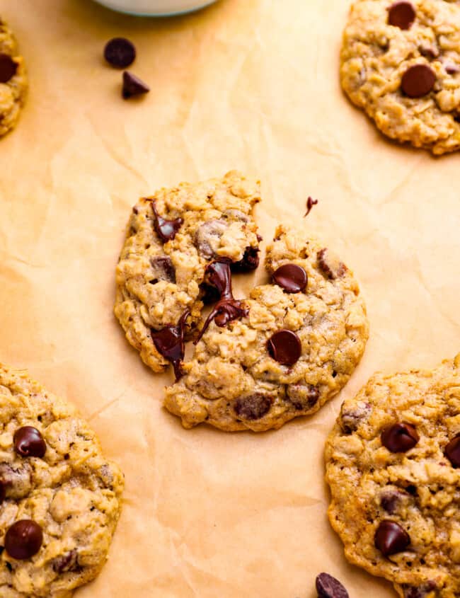 soft oatmeal chocolate chip cookies on parchment