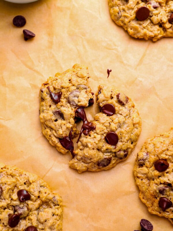 soft oatmeal chocolate chip cookies on parchment