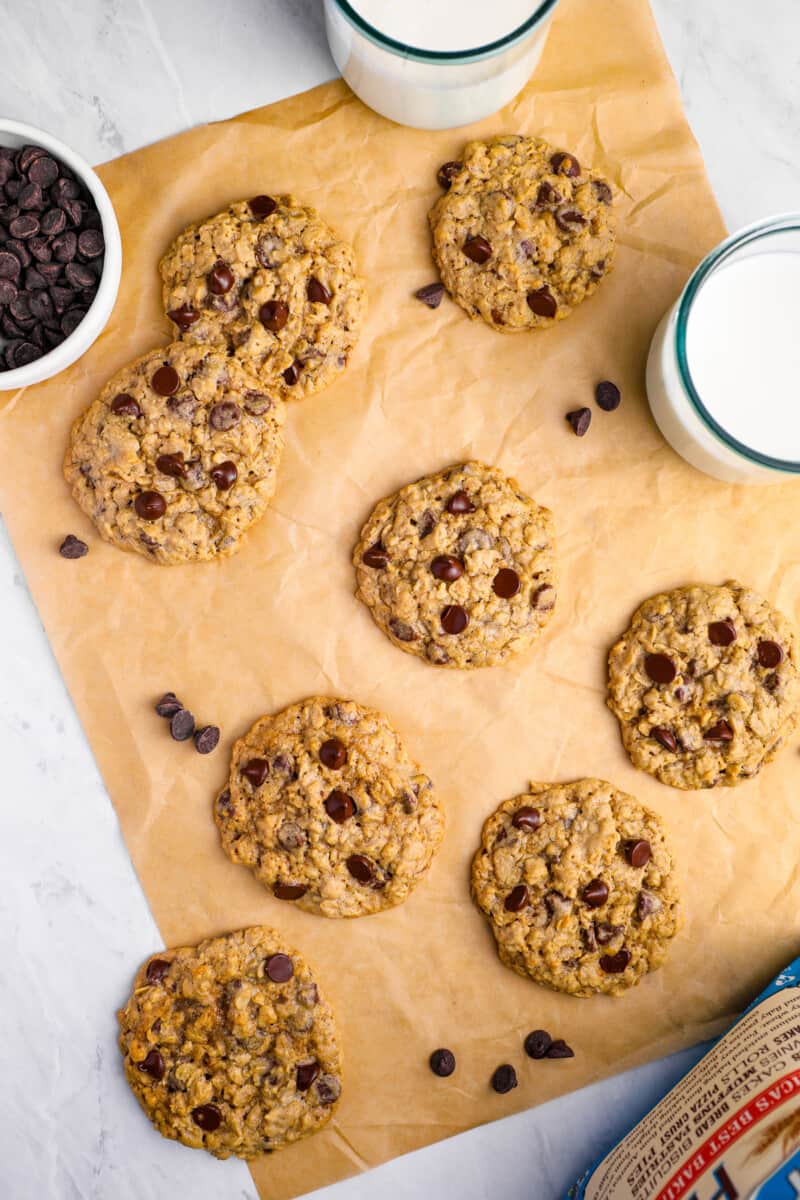 soft oatmeal chocolate chip cookies on parchment