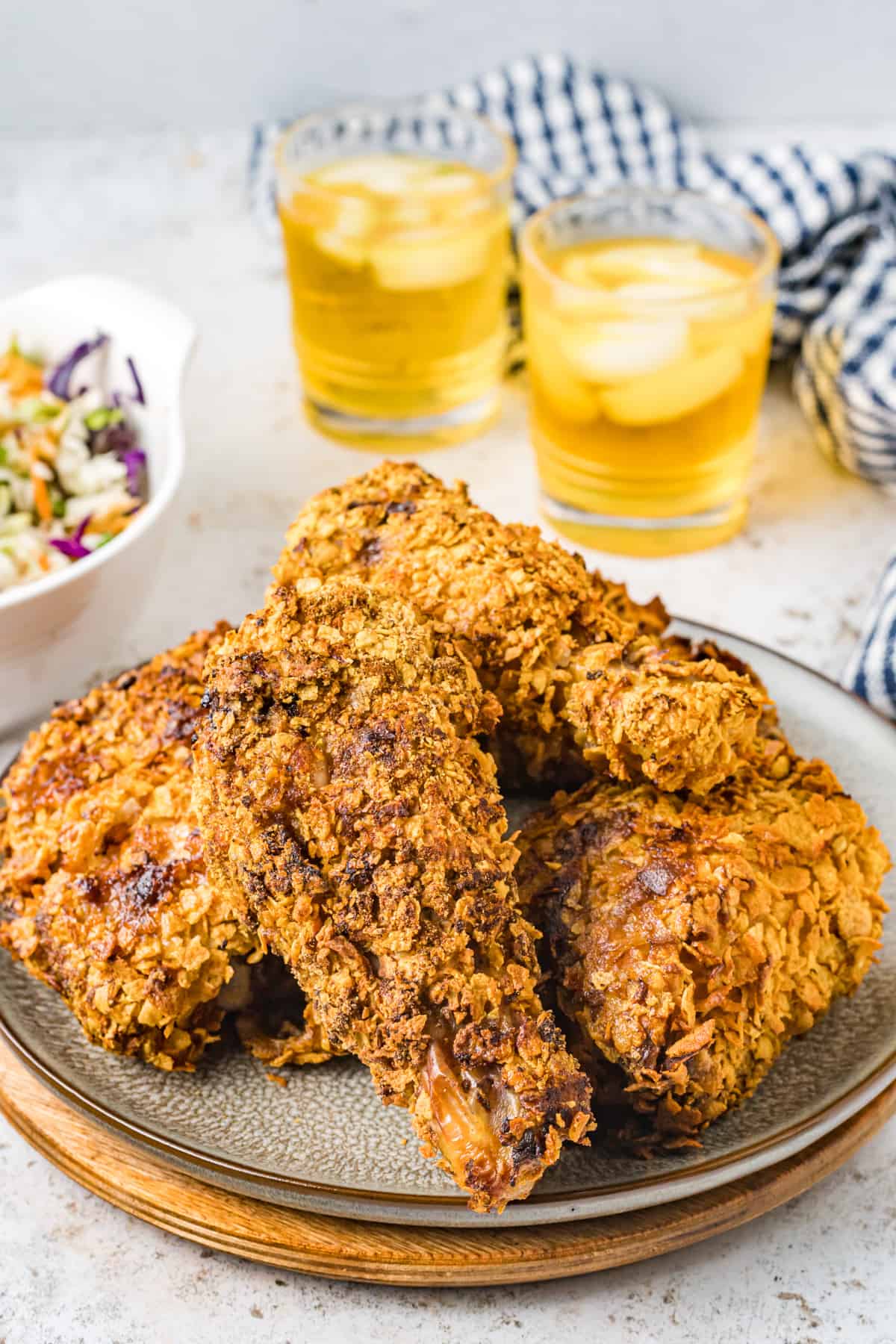 air fryer fried chicken on a white plate.