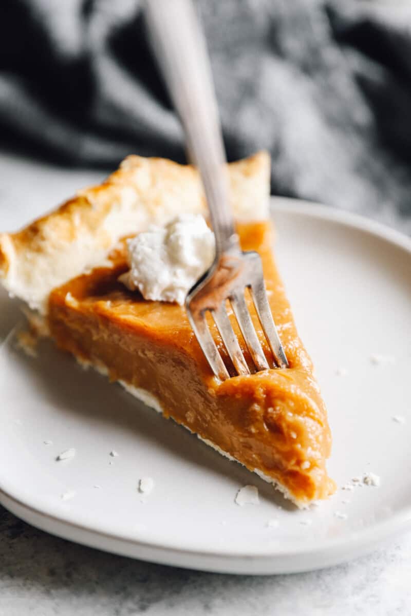 fork slicing into a piece of pie