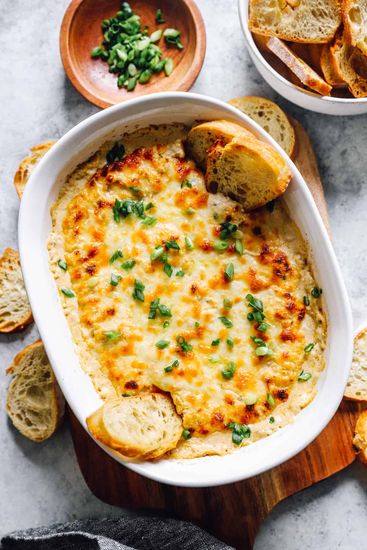 a baking dish filled with hot crab dip.