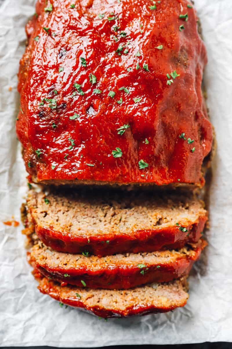 Overhead view of sliced meatloaf made in a Crockpot.