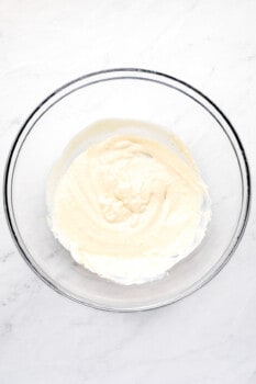 mayonnaise and ranch dressing in a glass bowl.