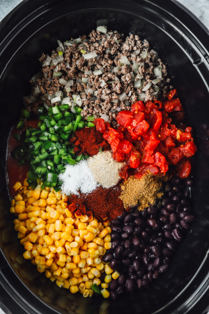 ingredients for crockpot taco soup in a crockpot.