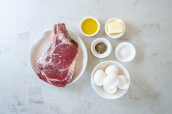 overhead view of ingredients for steak and eggs.