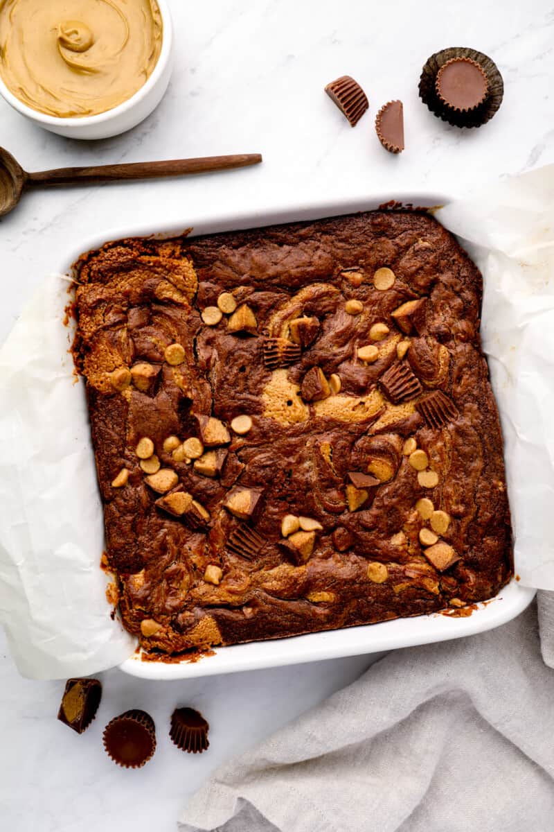 overhead view of peanut butter brownies in a square baking pan.