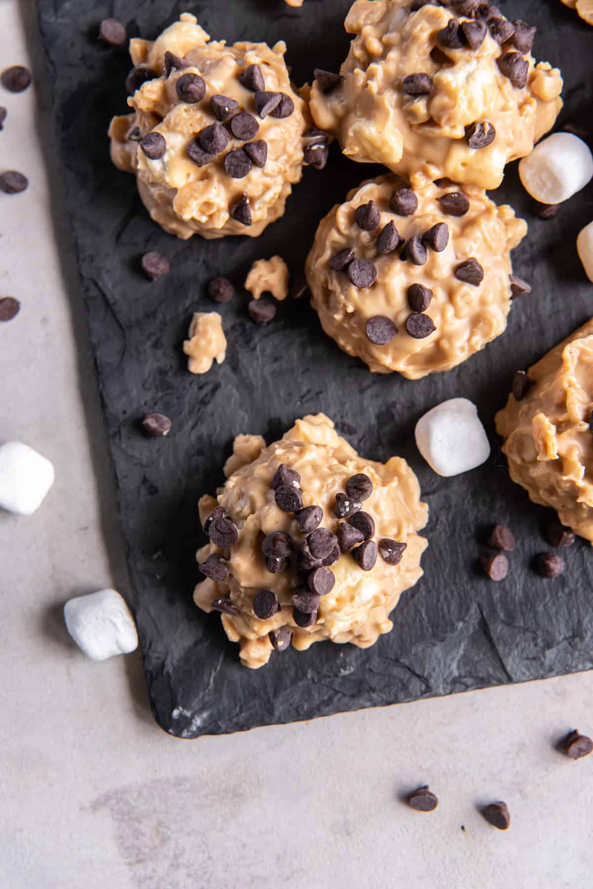 Overhead view of a slate tray of avalanche cookies.