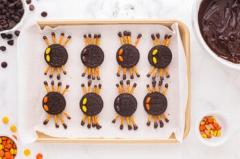 oreo spider cookies on a baking sheet.